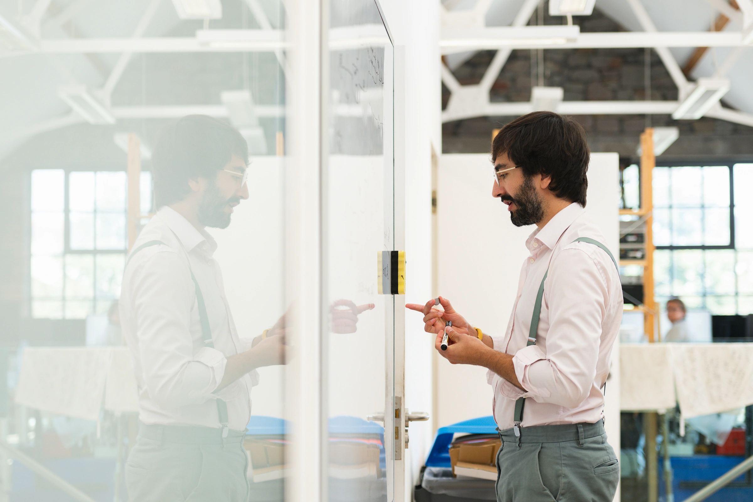 Man looking at a whiteboard